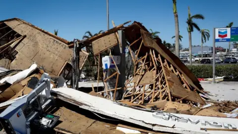 Reuters The ruins of a petrol station in Fort Myers