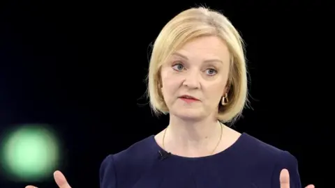 Reuters Conservative leadership candidate Liz Truss attends a hustings event