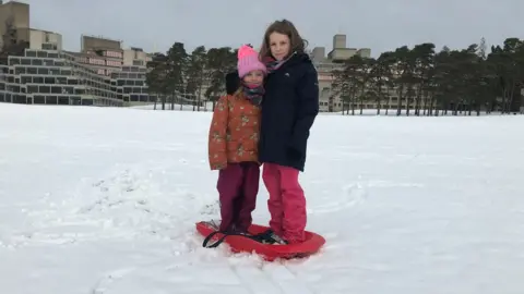 Family Photo Mollie and Nell enjoying the snow