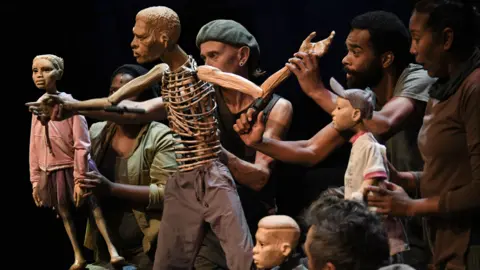 Fiona McPherson/Courtesy Baxter Theatre Nolufefe-Ntshuntshe,-Craig-Leo,-Carlo-Daniels,-Roshina-Ratnam,-Andrew-Buckland-in-Life-&-Times-of-Michael-K,-pic-by-Fiona-McPherson_
