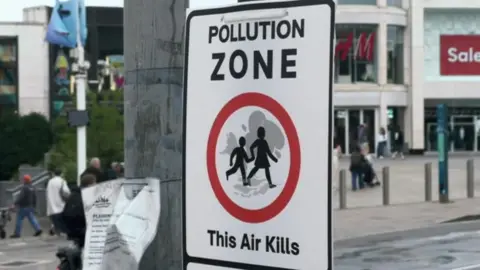 Pollution warning poster in Brighton
