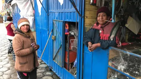 Dania is pictured at the market in El Alto