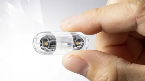 Getty Images Miniature capsule used in a colon endoscopy