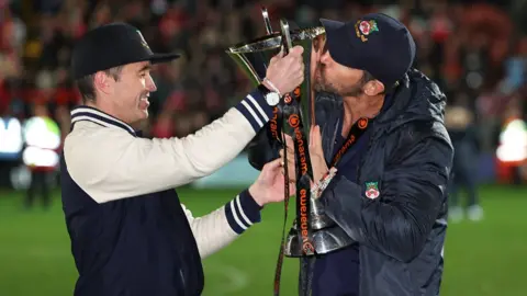 Getty Images Ryan and Rob with trophy