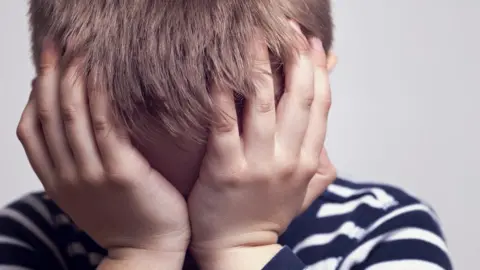 Getty Images sad child