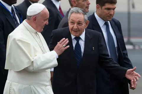 Getty Images Pope Francis walks with Cuba's President Raul Castro (R) as he arrives at Jose Marti International Airport on September 19, 2015 in Havana, Cuba.