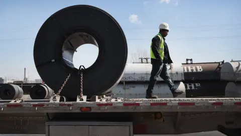 Getty Images Steel is loaded onto a truck for shipping at the NLMK Indiana steel mill on March 15, 2018 in Portage, Indiana.