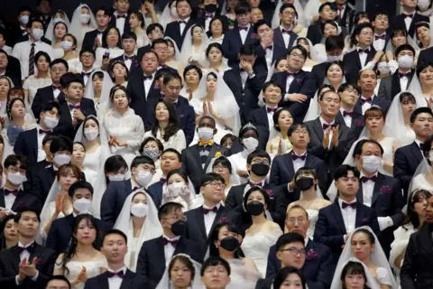 Reuters Couples at a mass wedding held by the Unification Church in Gapyeong-gun in South Korea.