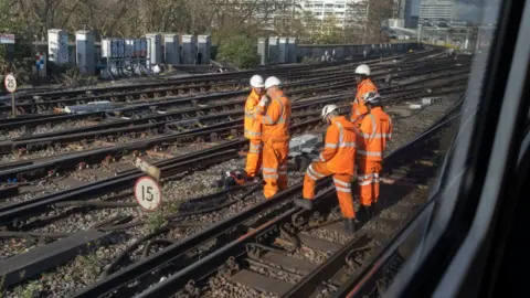 Getty Images Engineers on track