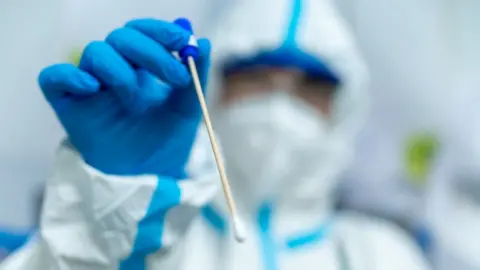 Getty Images Swab test examination