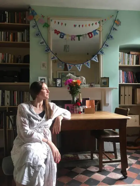 Hannah Morris Woman at a table