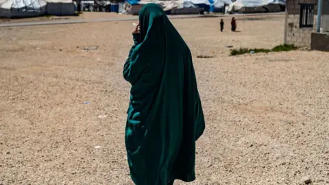 A French woman at a camp in Syria, where relatives of suspected IS fighters are held (file picture)