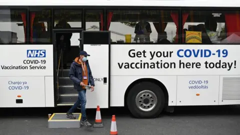 Getty Images A Covid-19 vaccination bus in Bolton