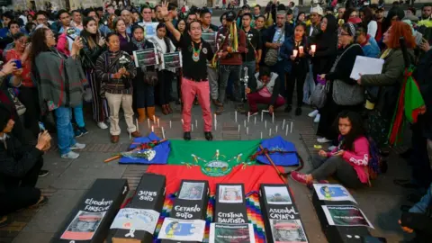 Getty Images Ceremony at Bolivar square in Bogota for indigenous leader killed, in October 2019