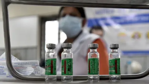 Getty Images Small bottles of the Covishield Covid vaccine