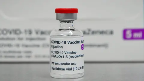 PA Media Covid vaccine bottle