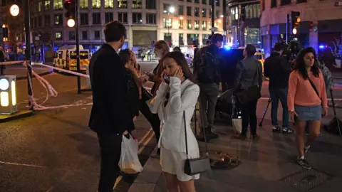 Getty Images People at the scene of the London Bridge attack