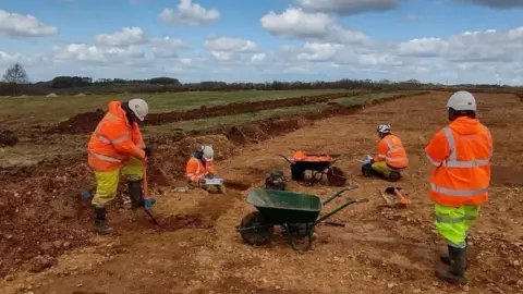 Workers on the A417