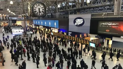 PA Commuters inside Waterloo Railway Station, London