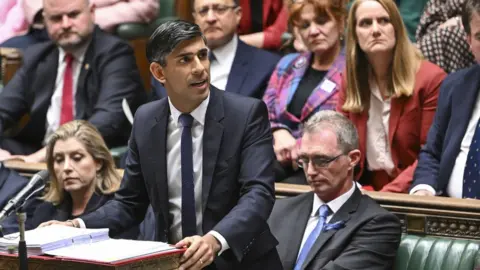 UK Parliament/Andy Bailey Sunak in the House of Commons