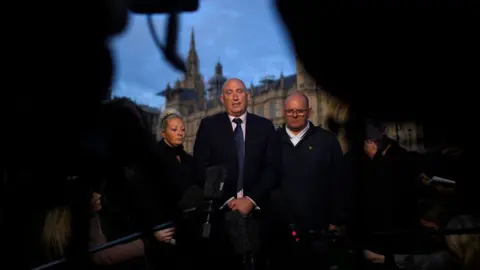 Getty Images Family spokesman Radd Seiger speaks to the media on behalf of the parents of Harry Dunn, Tim Dunn and Charlotte Charles, after meeting with Foreign Secretary Dominic Raab