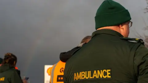 ADAM VAUGHAN/EPA-EFE/REX/Shutterstock Ambulance workers