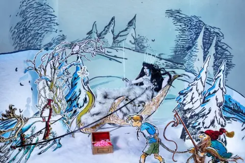 Fenwick A scene from the window showing the White Witch and Edmund