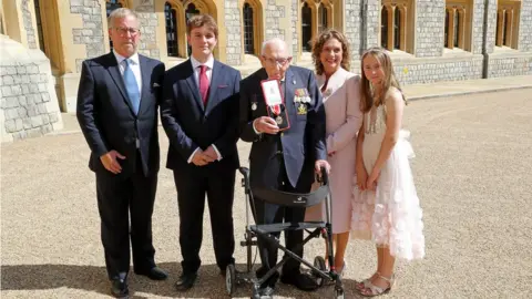 PA Media Captain Tom Moore and his family