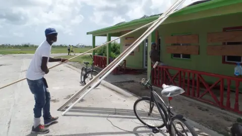 Gemma Handy KK Payne helps fix the local bakery on Barbuda