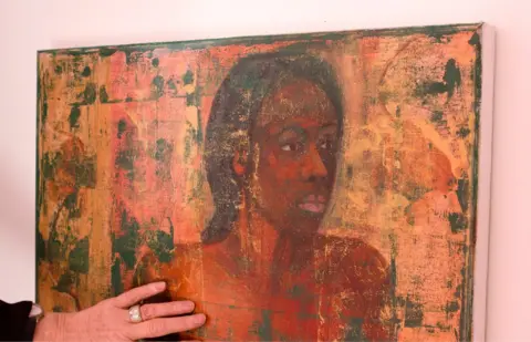 BBC Geraldine Crimmins with one of her paintings