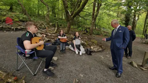 Liam McBurney/Reuters Traditional musicians performed for the prince in Slieve Gullion Forest Park