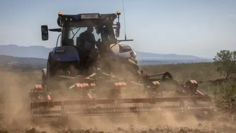 BBC A tractor in a field