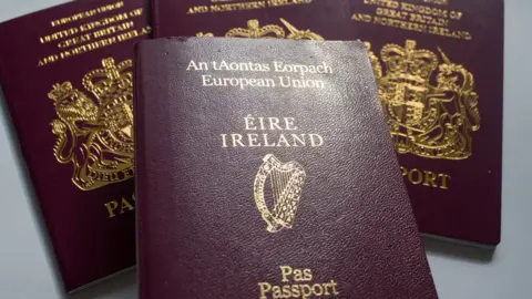 Matt Cardy/Getty Images Irish and British passports