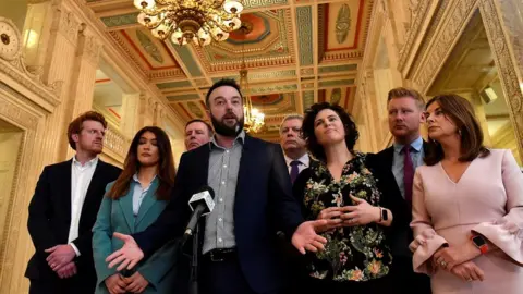 Reuters SDLP leader with assembly members