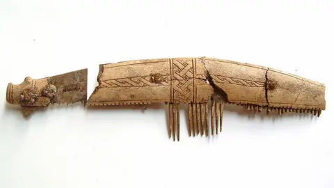 Suffolk County Council Carved Viking comb etched with design and missing most of its teeth
