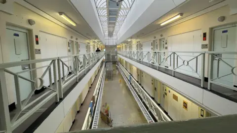 Shaun Whitmore/BBC The inside of C Wing at HMP Norwich.