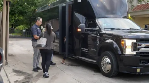 Chelsea Bailey, BBC News A patient boards a bus to begin traveling to New Mexico for an abortion.