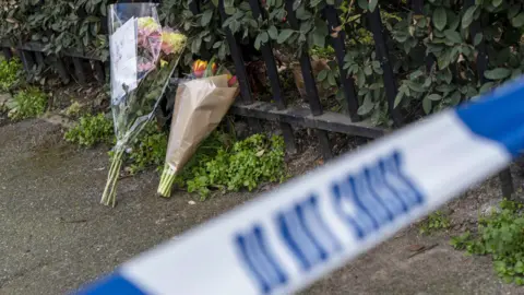Getty Images Flowers after stabbing