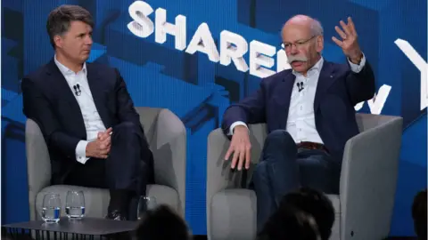 Getty Images The heads of BMW and Daimler, Harald Krüger and Dieter Zetsche,