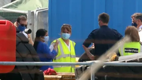 PA Media Home Secretary Priti Patel speaking to UK border officials