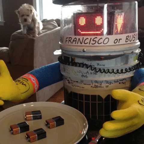 Ryerson University Hitchbot with plate of batteries