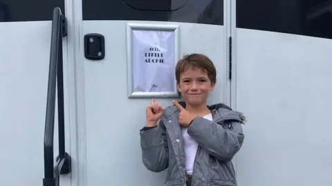 Family handout Dainton Anderson outside his trailer