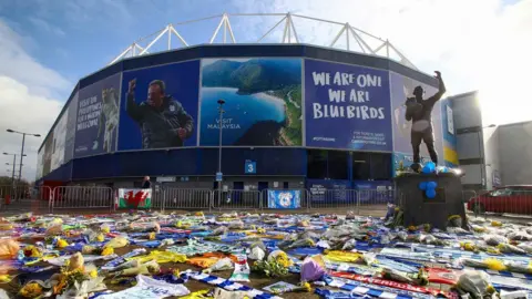 GEOFF CADDICK The area around Cardiff City's stadium covered in floral tributes to Emiliano Sala