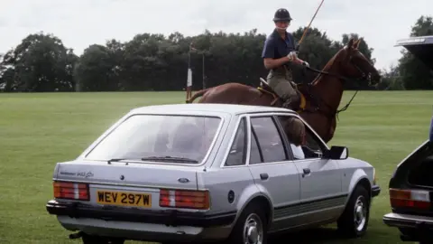 Reuters Princess Diana watching Prince Charles play polo in the car