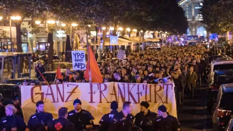 Getty Images Protesters took to the streets to voice their opposition to the AfD breakthrough