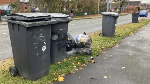 BBC Unemptied bins in Warrington