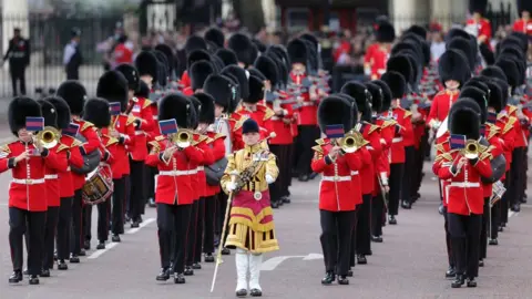 Getty Images The Queen's guard, taking part in Trooping the Colour