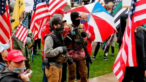 Getty Images Armed protesters