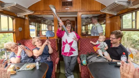 Getty Images  Elaine Ball takes part in The Queen's Baton Relay as it visits Bridgnorth