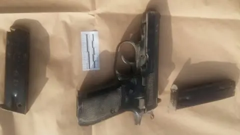 Israeli Police A photo of the gun used by the attacker, released by Israeli police